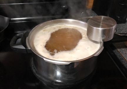 Boiling the wort in my little kettle.